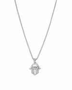 Silver hamsa pendant necklace with cz stones on white background. 