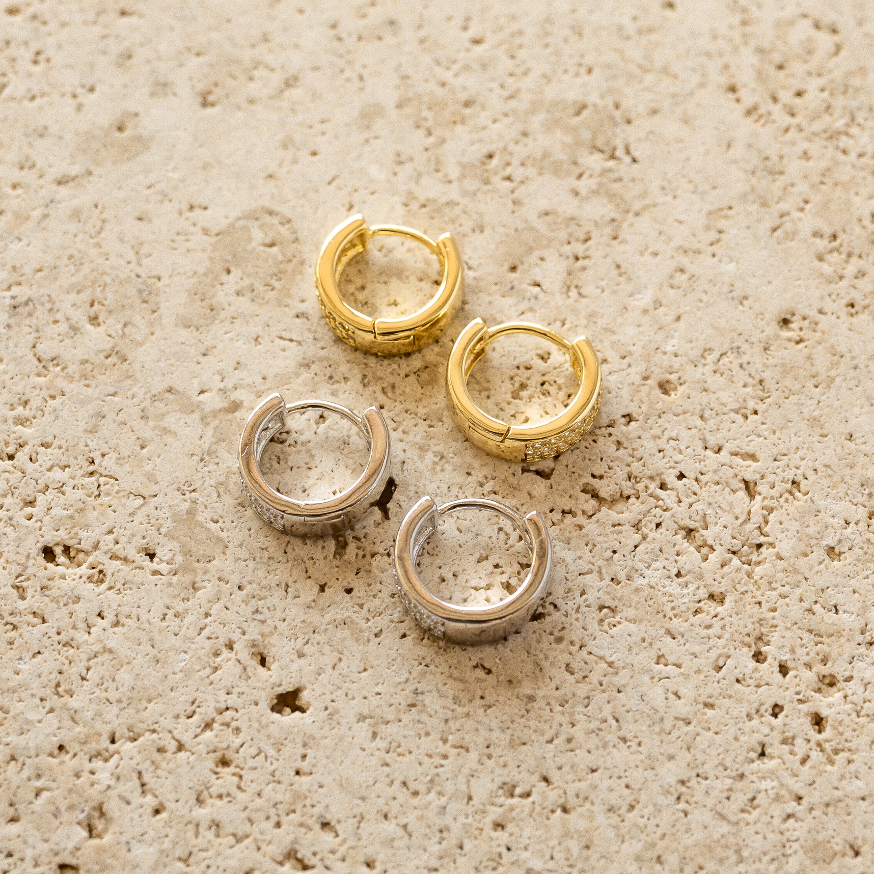 Gold and silver small huggie hoops