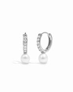 Luxury sterling silver studded diamond pearl charm earrings on white background