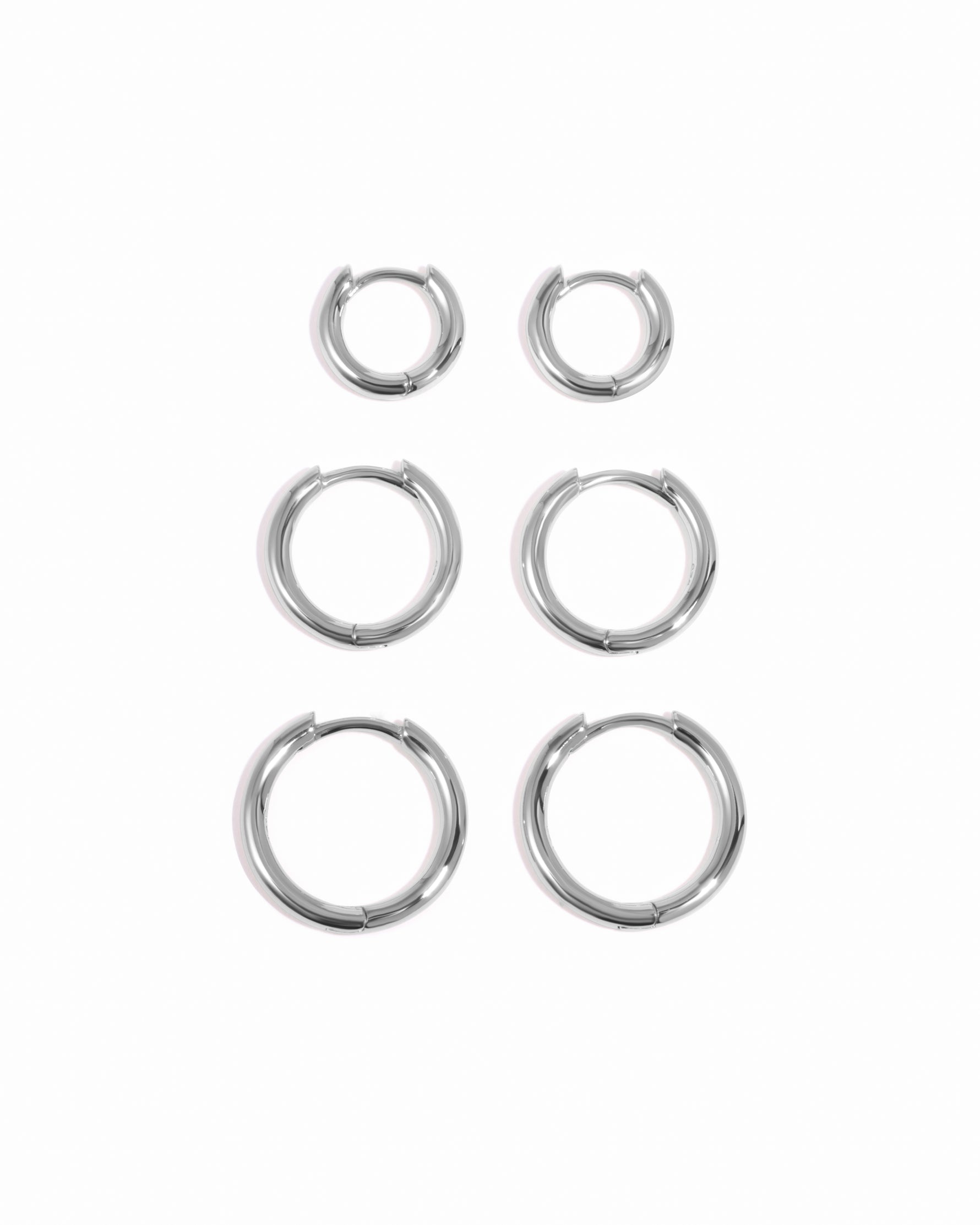 Sterling silver small, medium, and big minimalist hoop earrings in a set