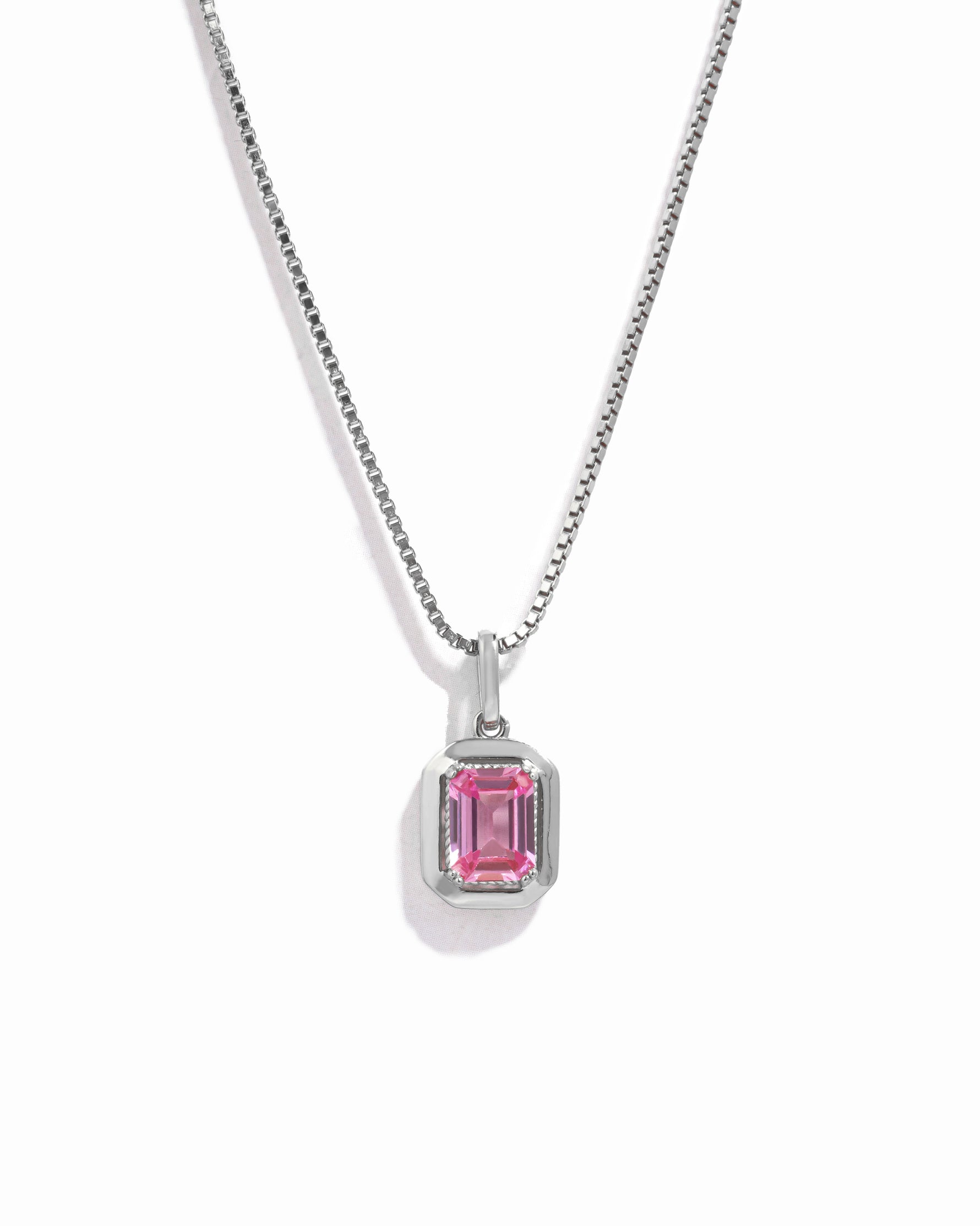 silver pendant necklace on box chain