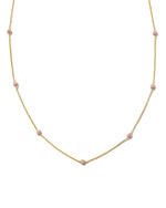 Delicate gold pave ruby beaded chain necklace.