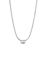 Silver baguette bezel diamond statement pendant necklace on white background