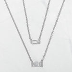 Silver minimalist baguette necklaces in a small and medium size. 