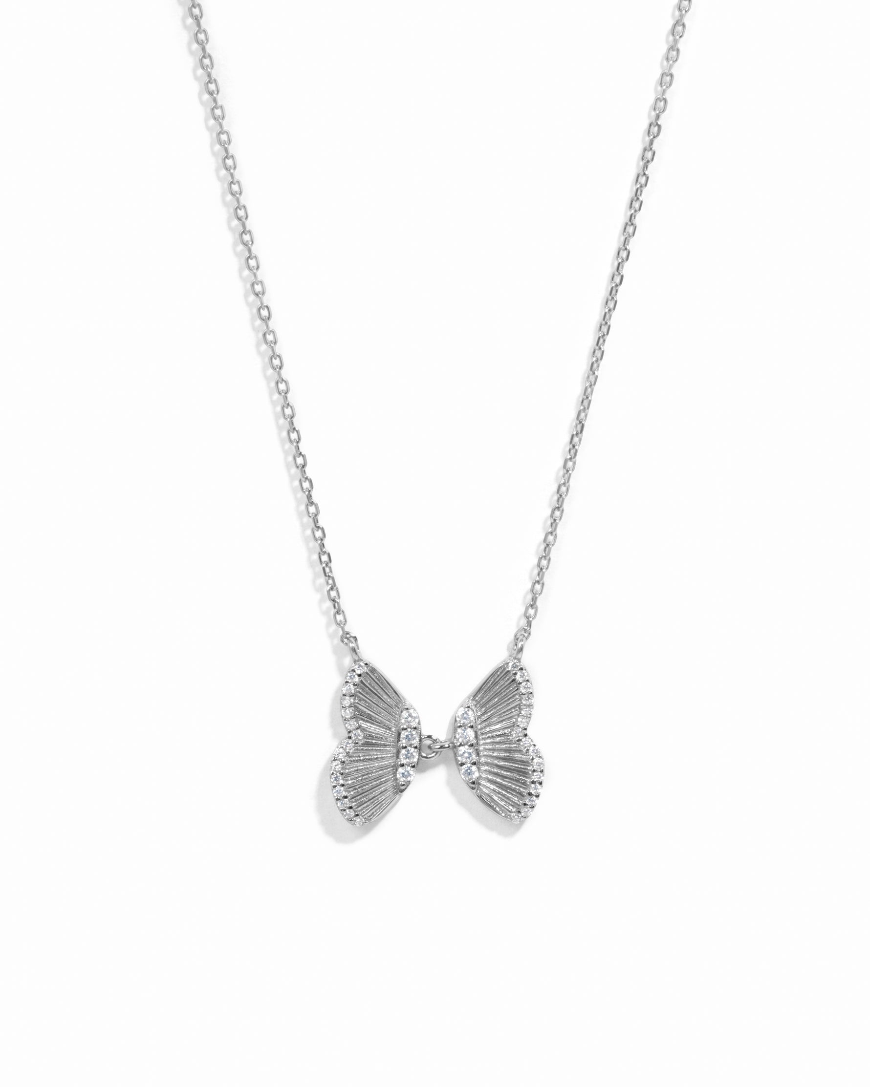 Silver statement butterfly charm pendant necklace. 