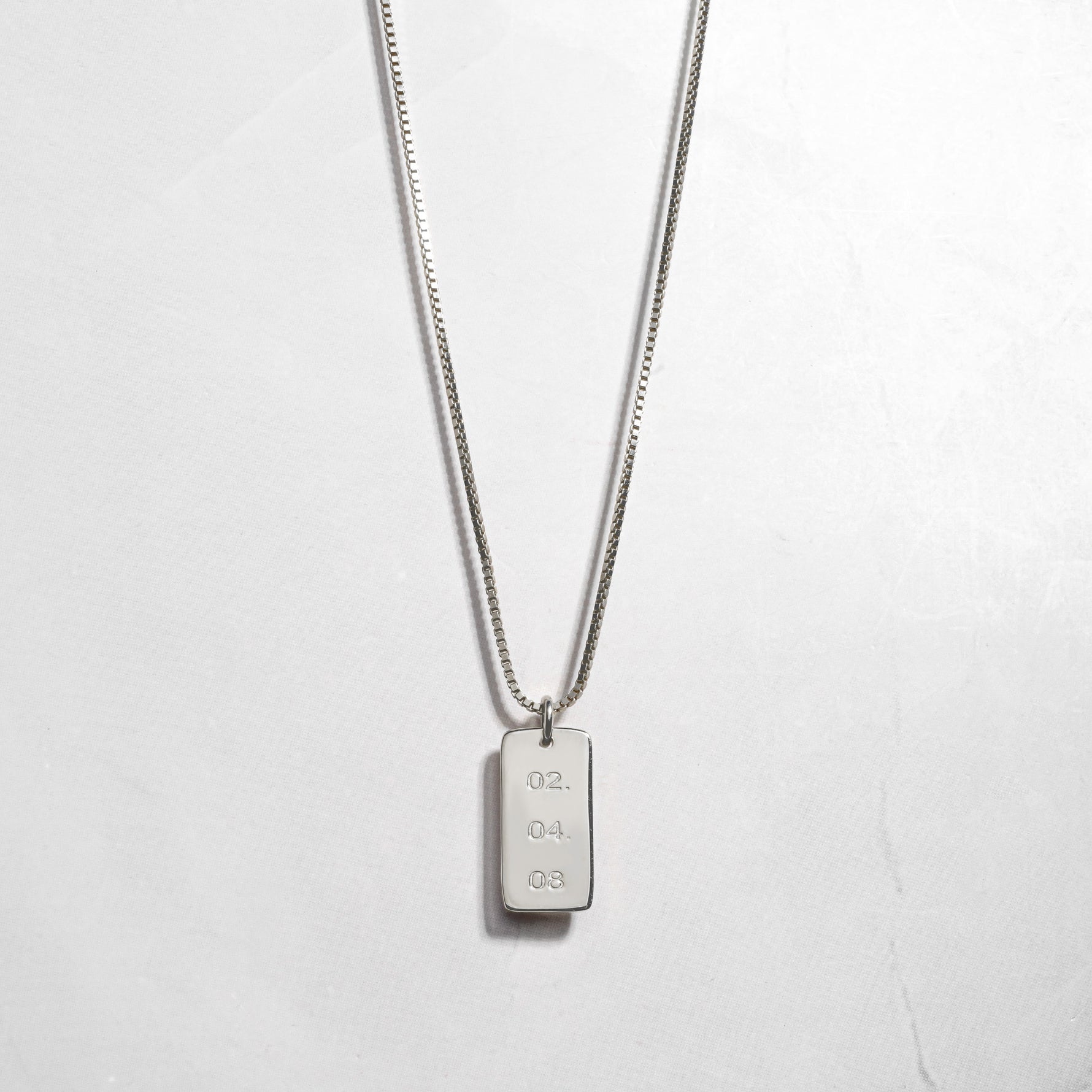 Delicate sterling silver customizable dog tag pendant necklace with important dates