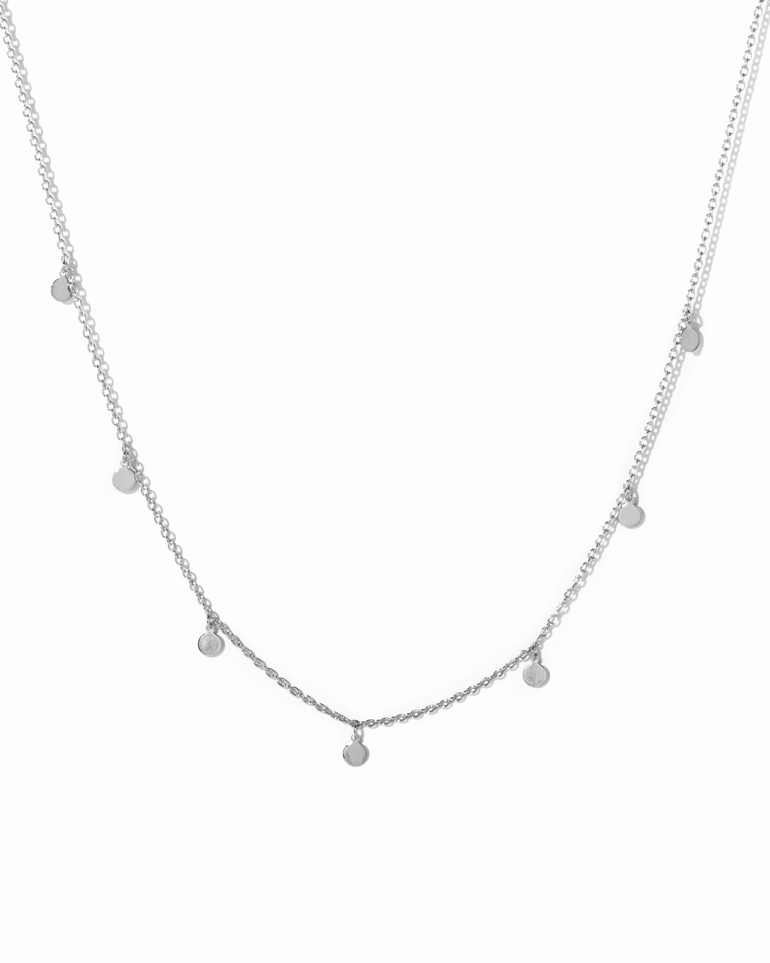 Sterling silver disc charm necklace. 