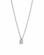 minimalist sterling silver cz necklace on white background