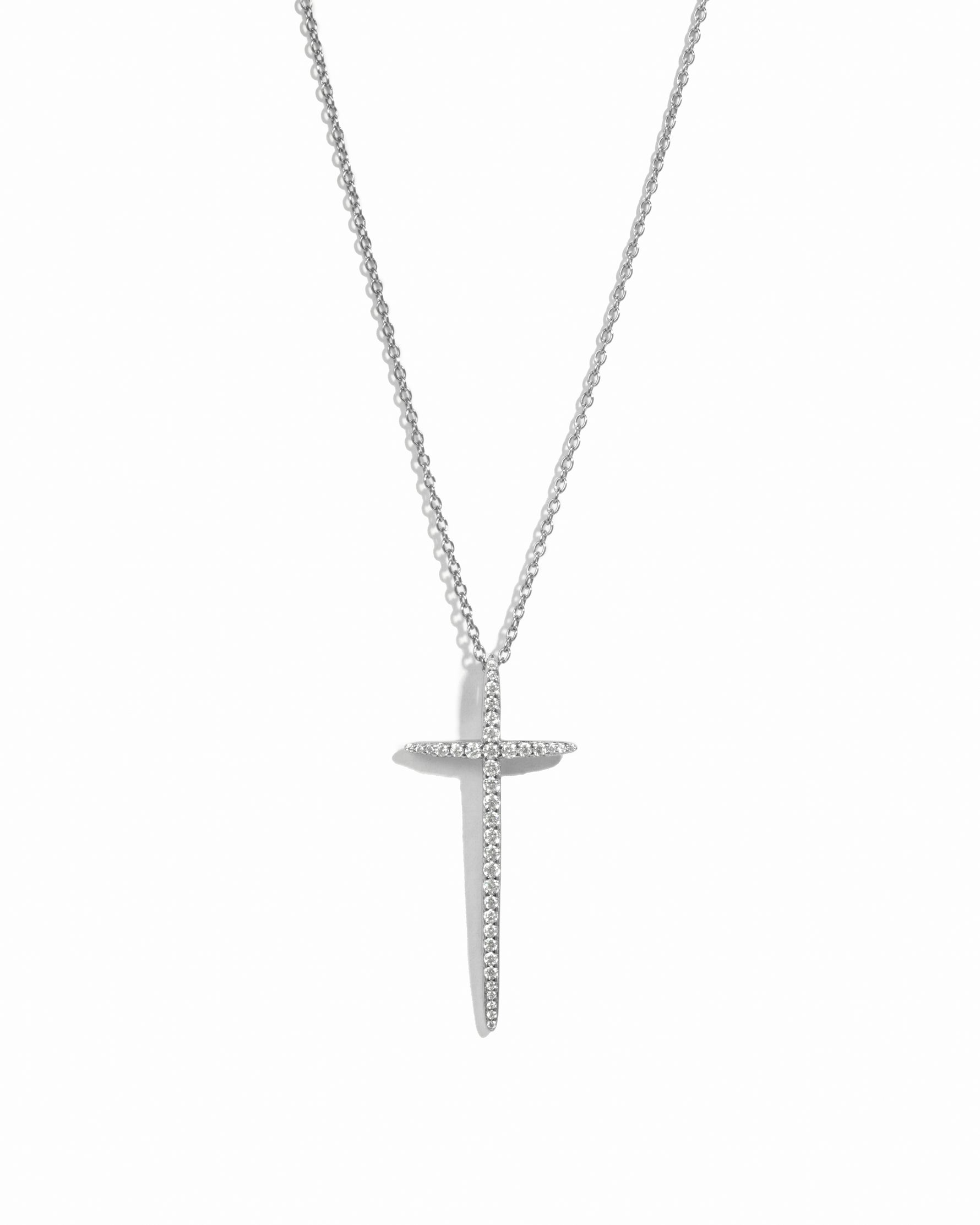 silver large cz cross pendant necklace on white background