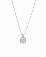 Sterling silver mother of pearl circle charm pendant necklace with cross.