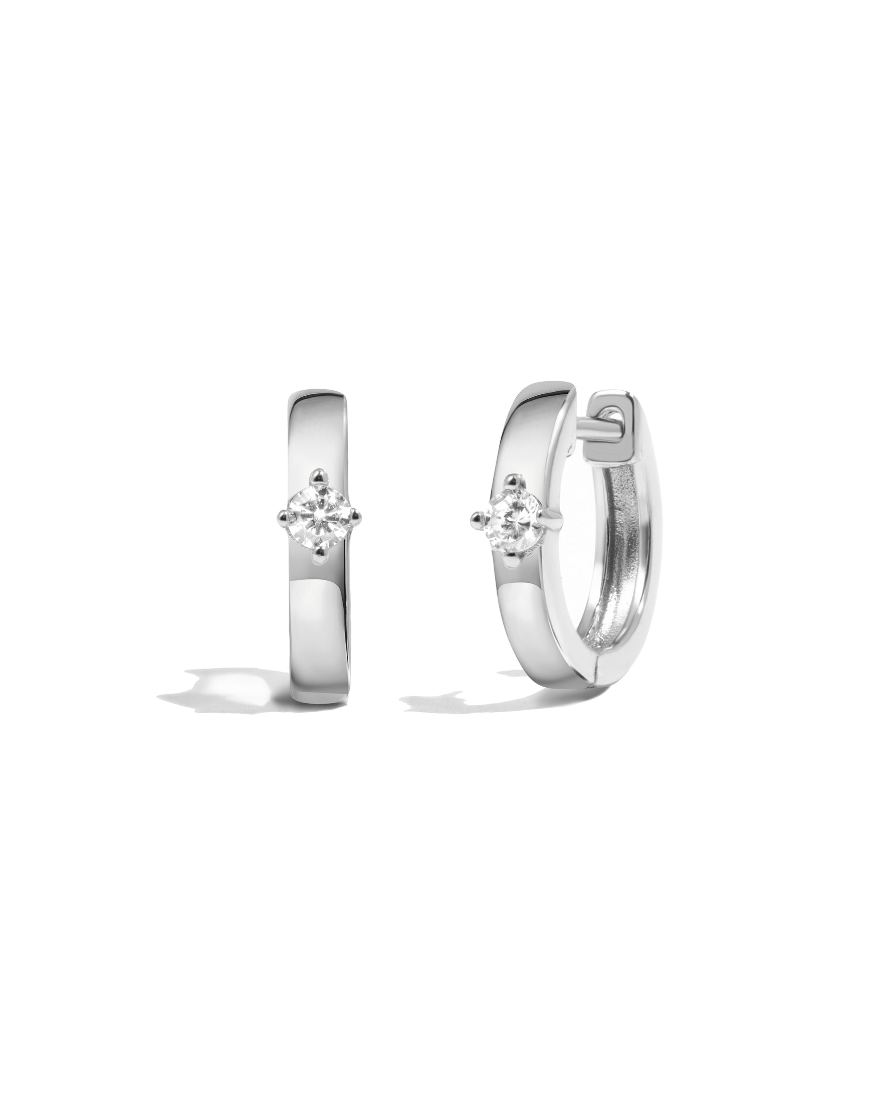 Classic sterling silver hoop earrings with solitaire diamond