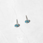 Sterling silver turquoise flower stud earrings with diamond center. 