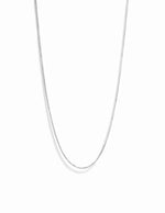 Silver box chain necklace on white background