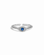 Sterling silver adjustable beaded evil eye ring on white background. 