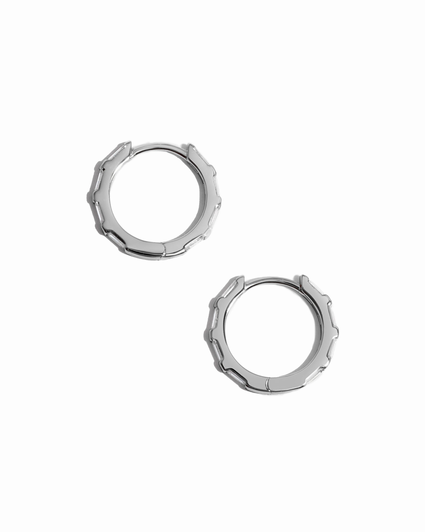 Sterling silver baguette huggie hoops from the side angle