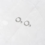 Sterling silver pearl charm diamond hoop earrings. 