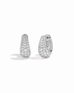 closeup image of sterling silver hoop earrings with cubic zirconia diamonds