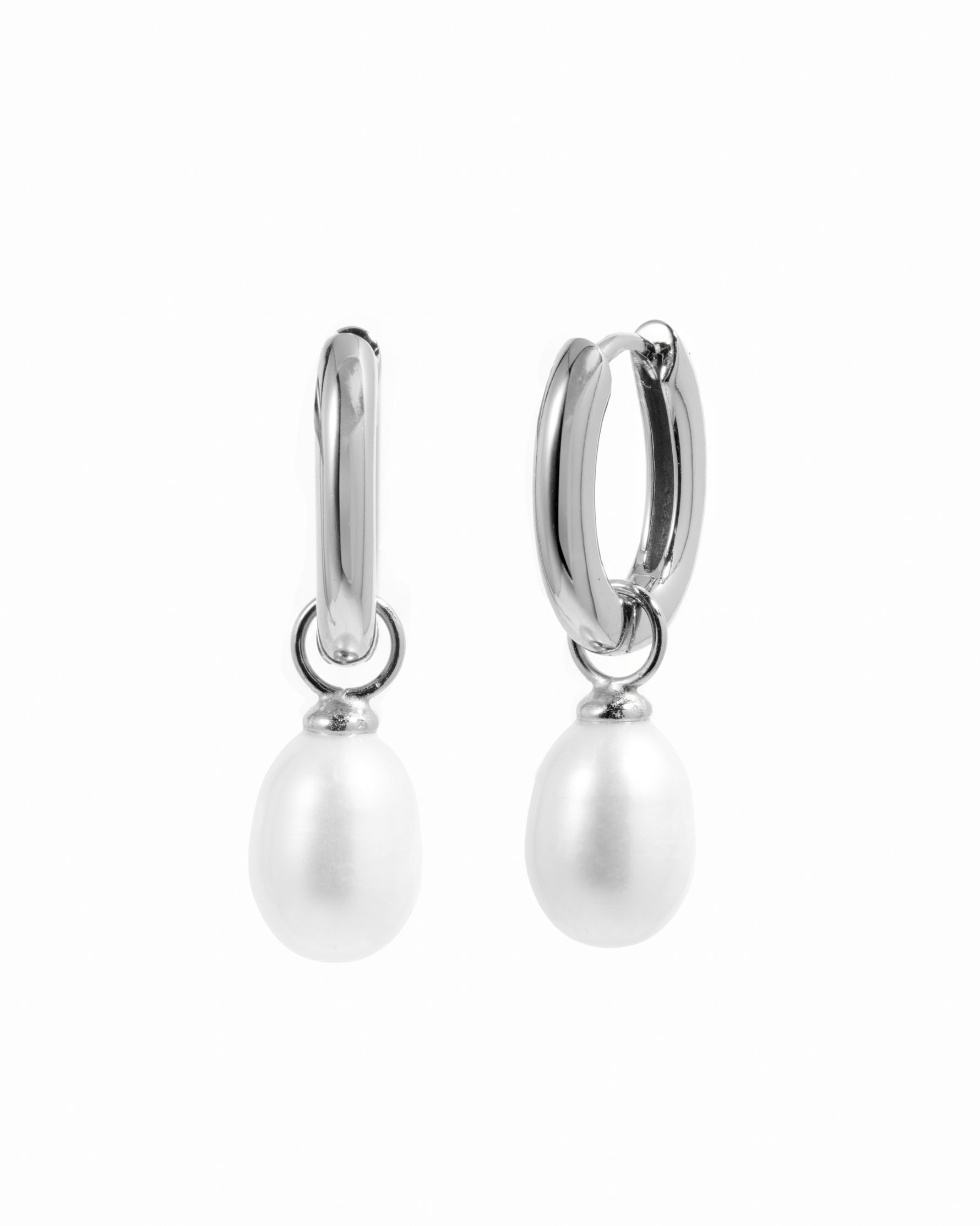 Sterling silver hoop earrings with versatile removable pearl charms.