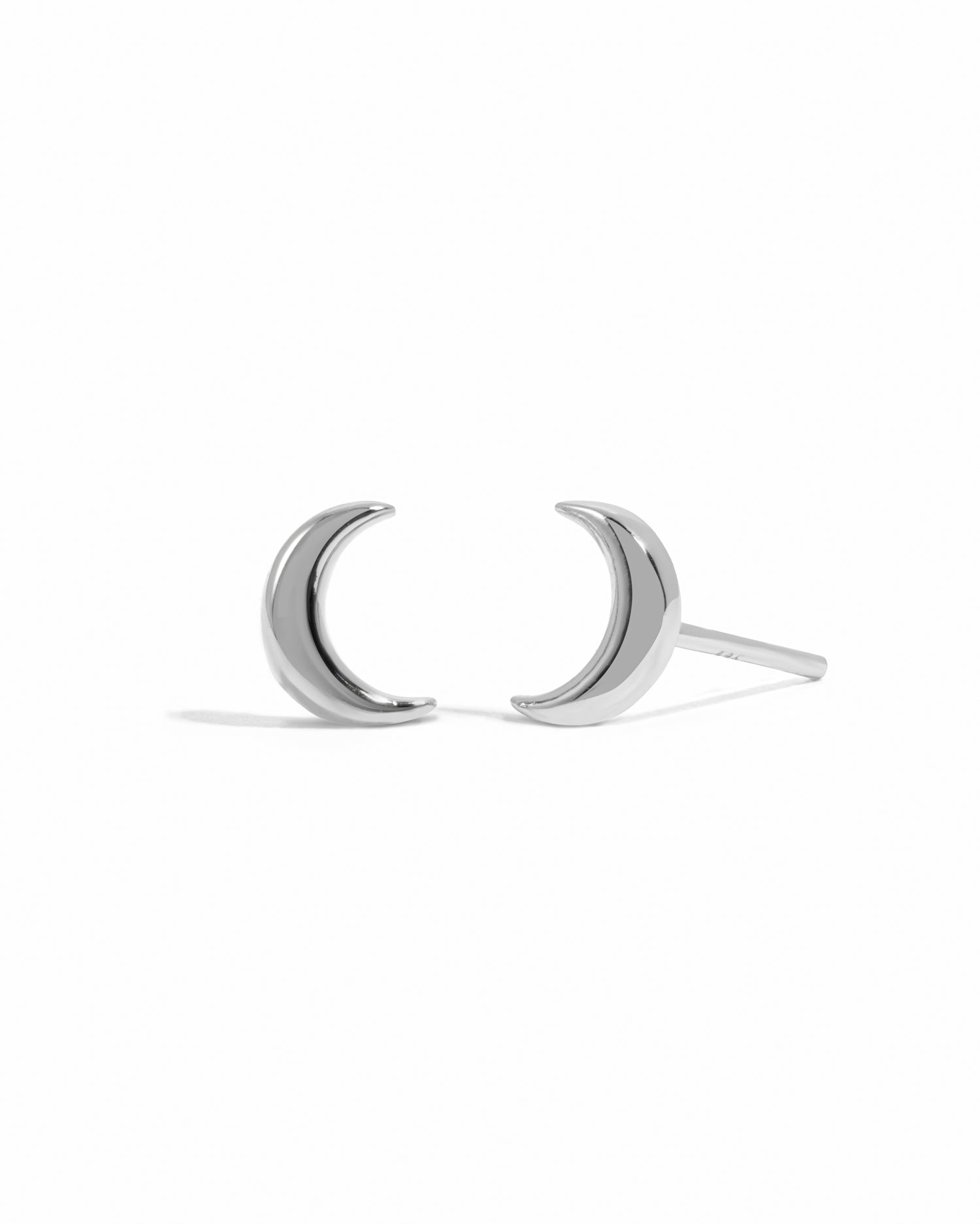 Sterling silver plain moon stud earrings by Sami Jewels, small round moon-shaped jewelry with a polished finish.