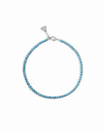 Sterling silver turquoise round tennis anklet on white background