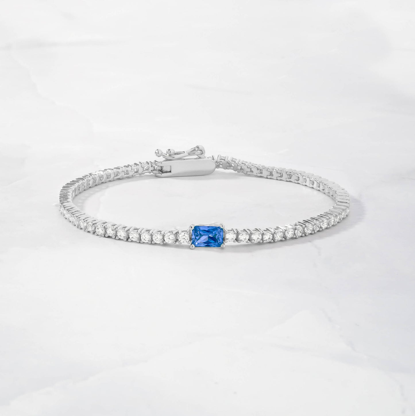 Tennis Bracelet with Sapphire Baguette Charm