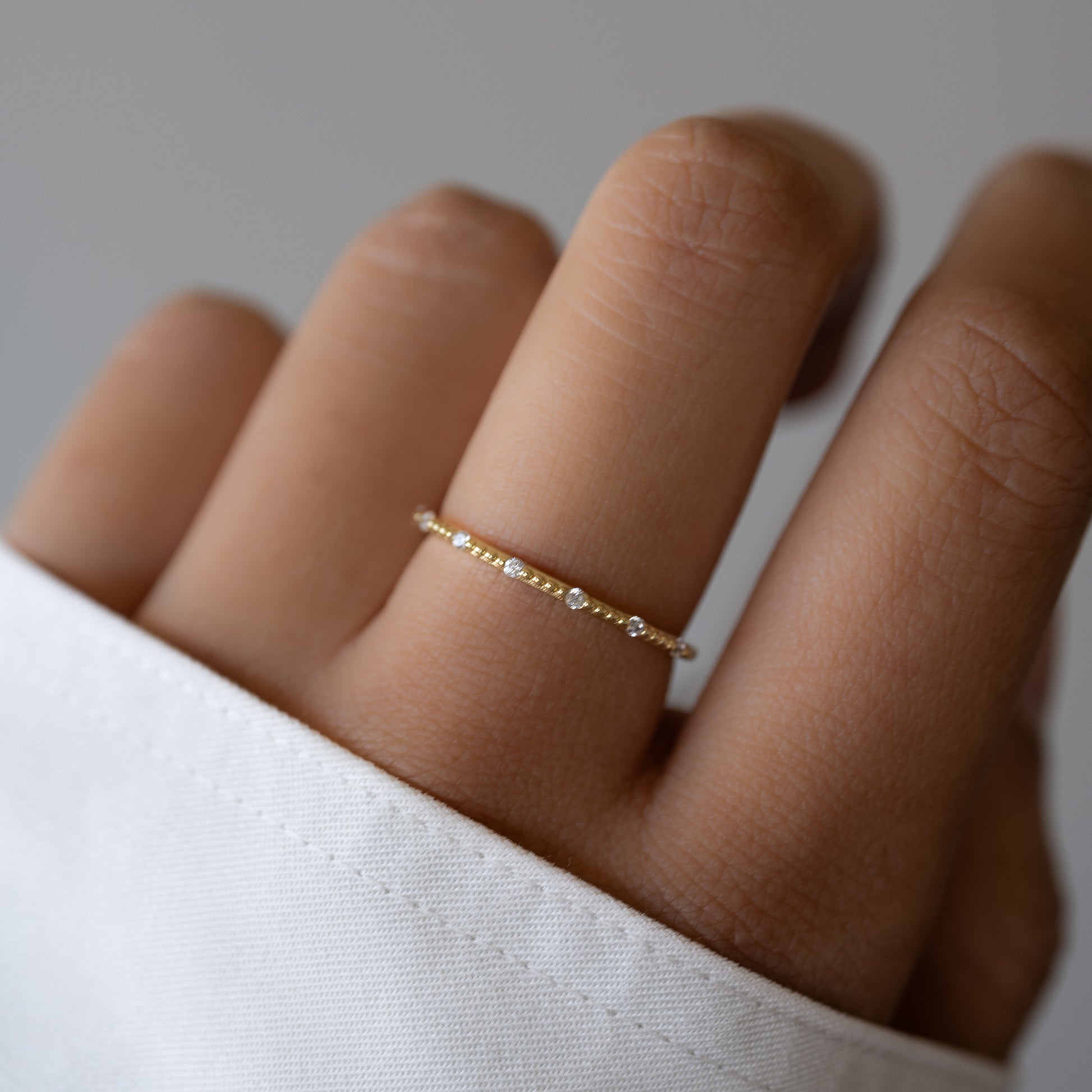 Dainty stacking ring on model
