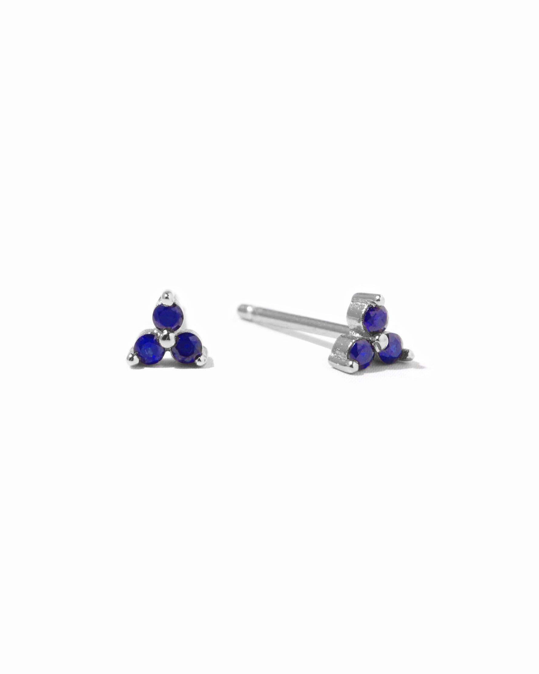 Dainty sterling silver sapphire stud earrings.