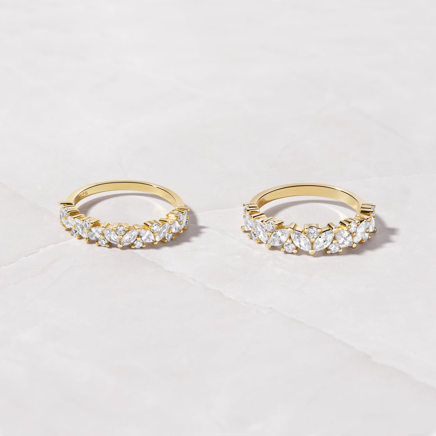 Multi Stone Ring with marquise and round stones in 14k Gold plating.
