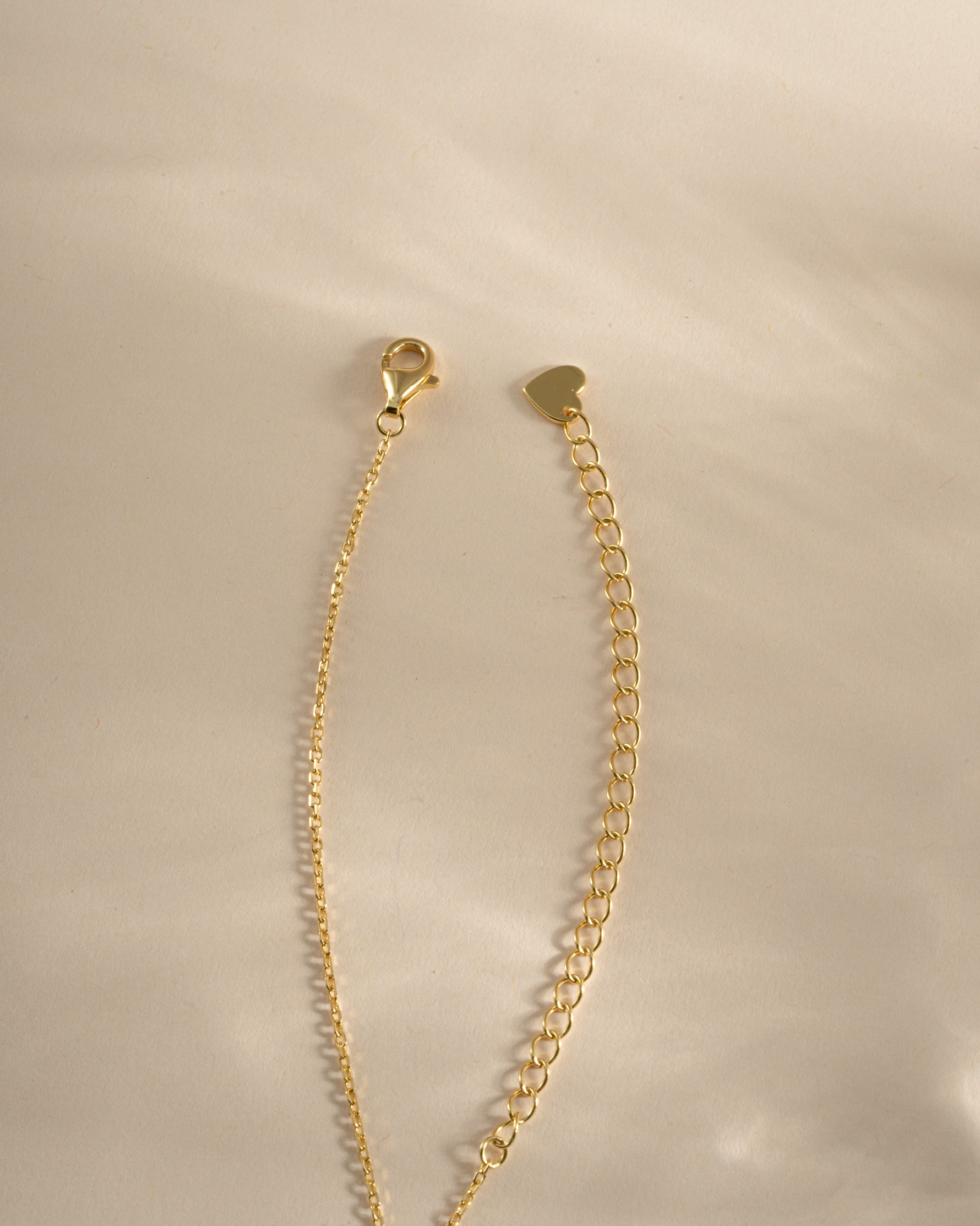 Gold Aqua Flower Necklace by Sami Jewels featuring a delicate aqua flower pendant with lobster clasp closure.