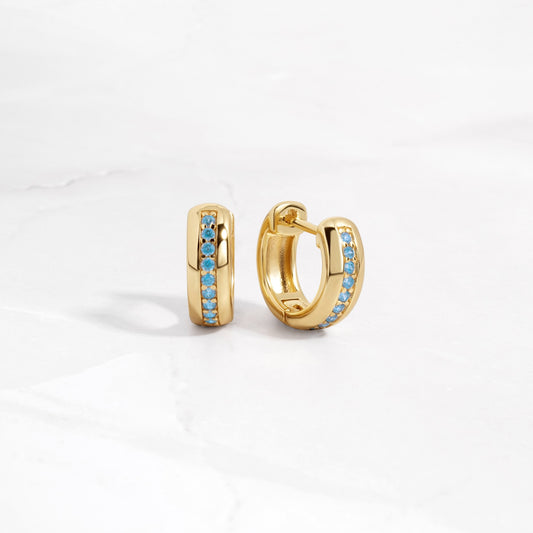 Tiny aquamarine hoop earrings in gold