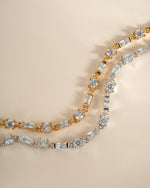 Gold and silver Baguette & Solitaire Diamond Bracelet by Sami Jewels featuring sparkling diamonds and elegant design.