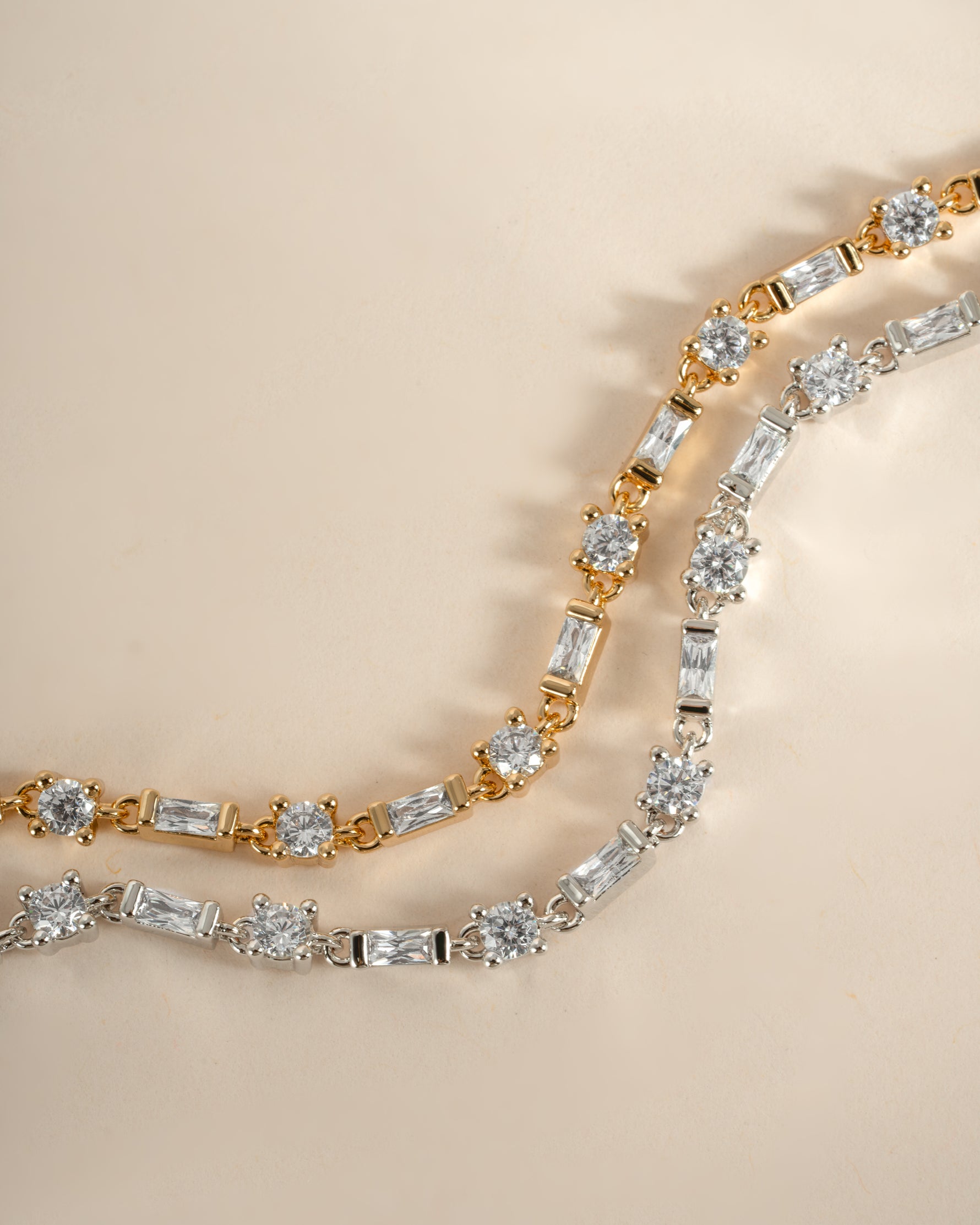Gold and silver Baguette & Solitaire Diamond Bracelet by Sami Jewels featuring sparkling diamonds and elegant design.