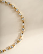 Close-up of Sami Jewels Baguette and Solitaire Diamond Bracelet in gold, showcasing the elegant design and sparkling diamonds.