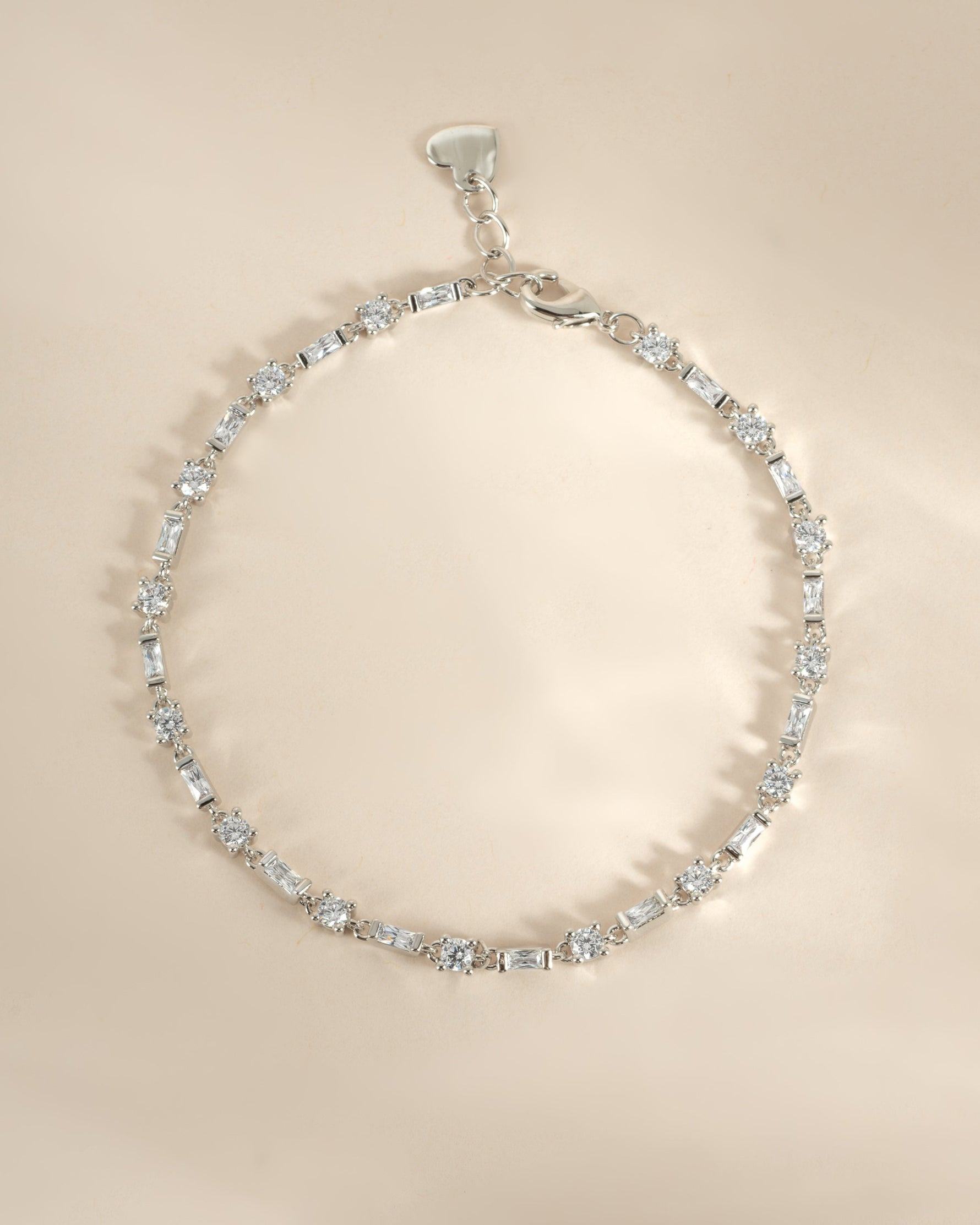 Close-up of Sami Jewels' silver Baguette & Solitaire Diamond Bracelet showcasing baguette-cut and solitaire diamonds.