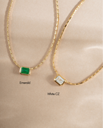 White CZ Baguette Bezel Statement Necklace by Sami Jewels featuring emerald and white cubic zirconia stones.