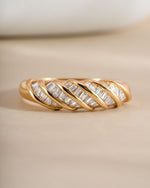Close-up of Sami Jewels gold baguette croissant ring, showcasing detailed design and elegant craftsmanship.