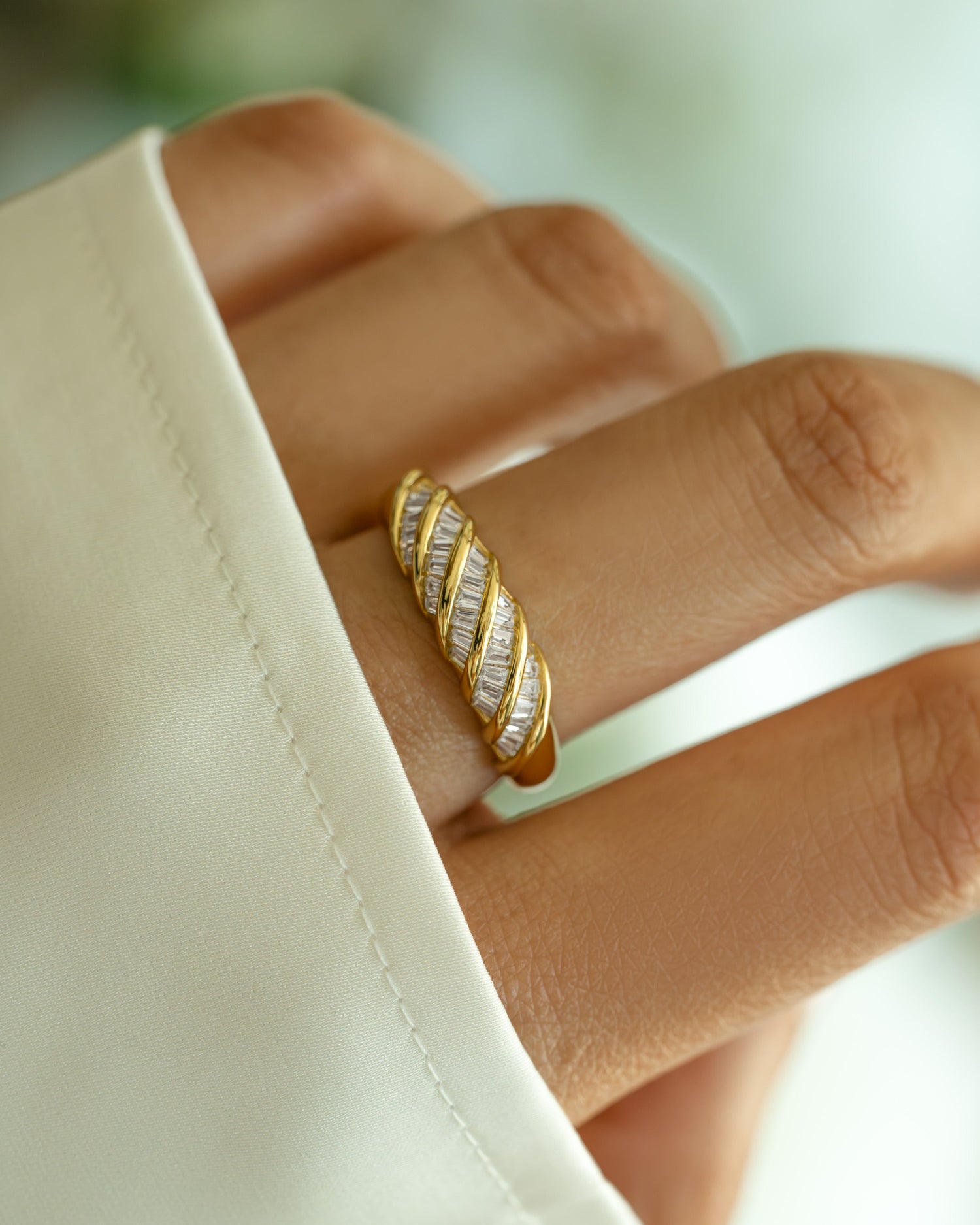 Gold Baguette Croissant Ring by Sami Jewels featuring a detailed croissant-shaped design, perfect for elegant jewelry collection.