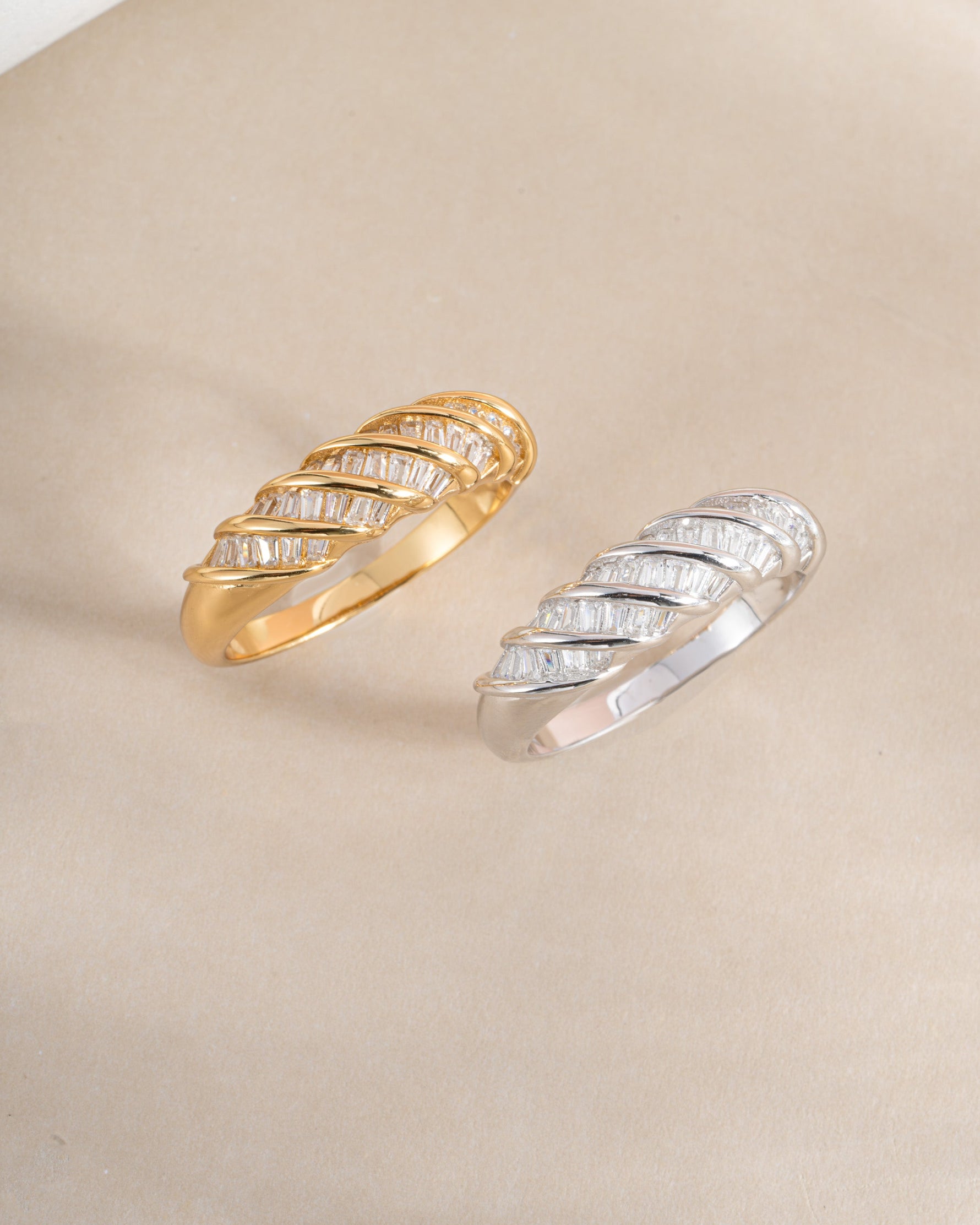 Sami Jewels Baguette Croissant Ring in sterling silver and gold, featuring a detailed croissant-shaped design on a stylish ring.