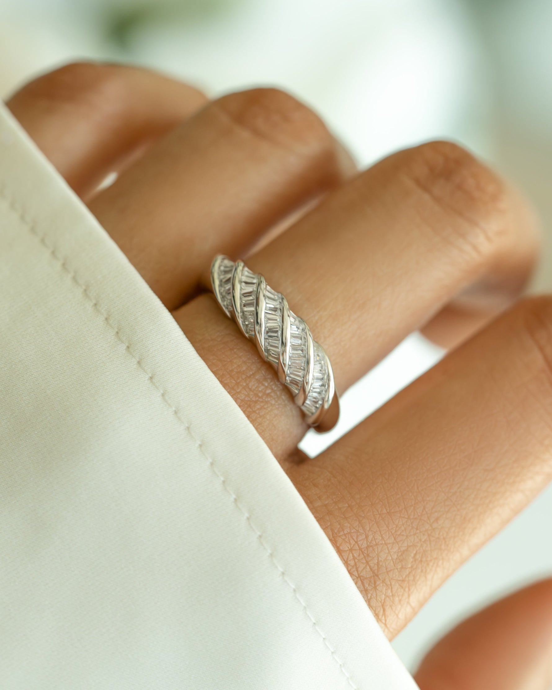 Sterling silver baguette croissant ring by Sami Jewels, featuring detailed pastry design on a elegant ring band.