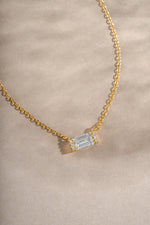 Close-up of Sami Jewels gold baguette diamond necklace highlighting the elegant baguette-cut diamonds and fine craftsmanship.