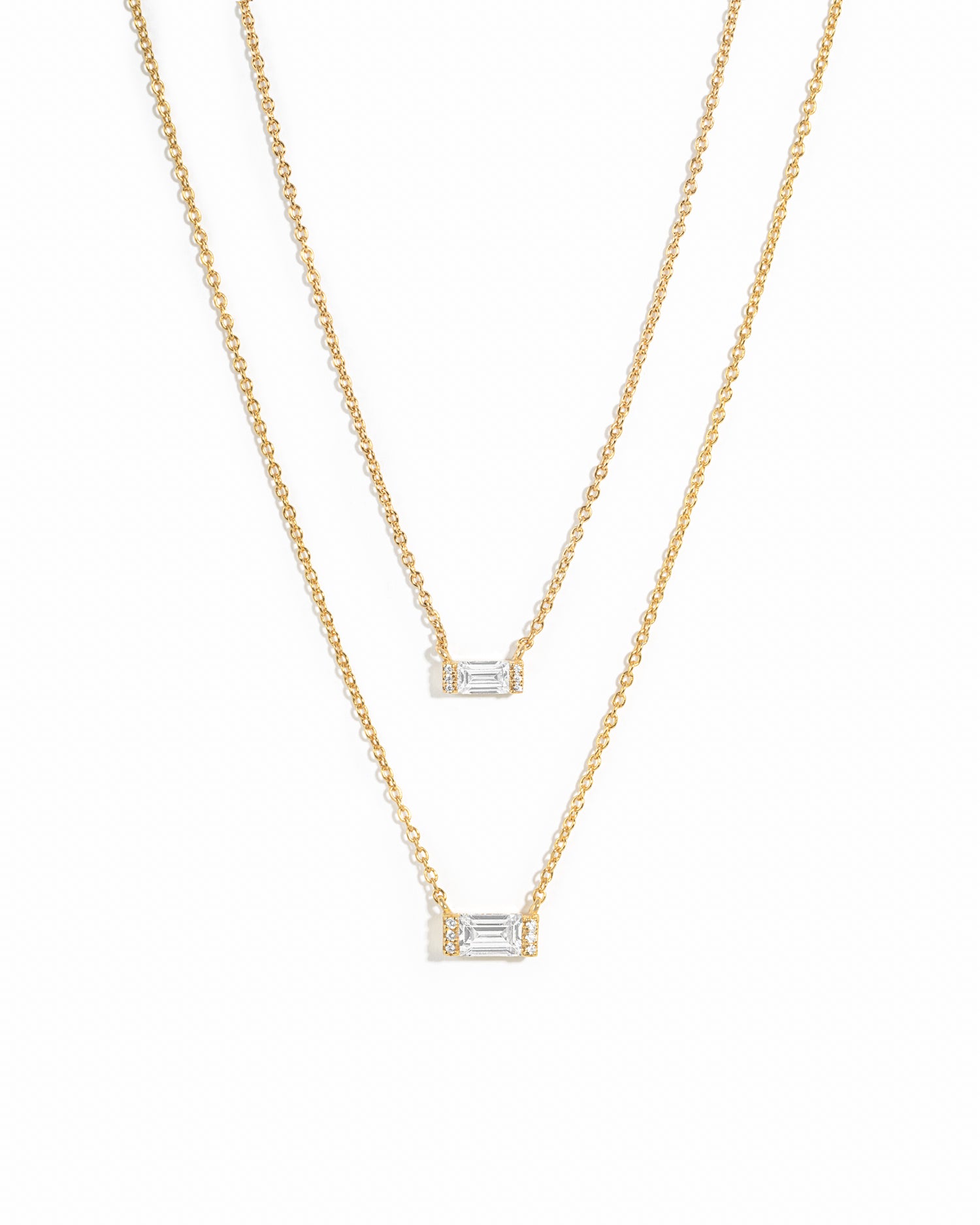 Gold Baguette Diamond Necklace from Sami Jewels displayed on a white background, showcasing elegant jewelry design.