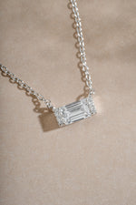 Sterling silver Baguette Necklace by Sami Jewels featuring a baguette diamond pendant with stone detail.