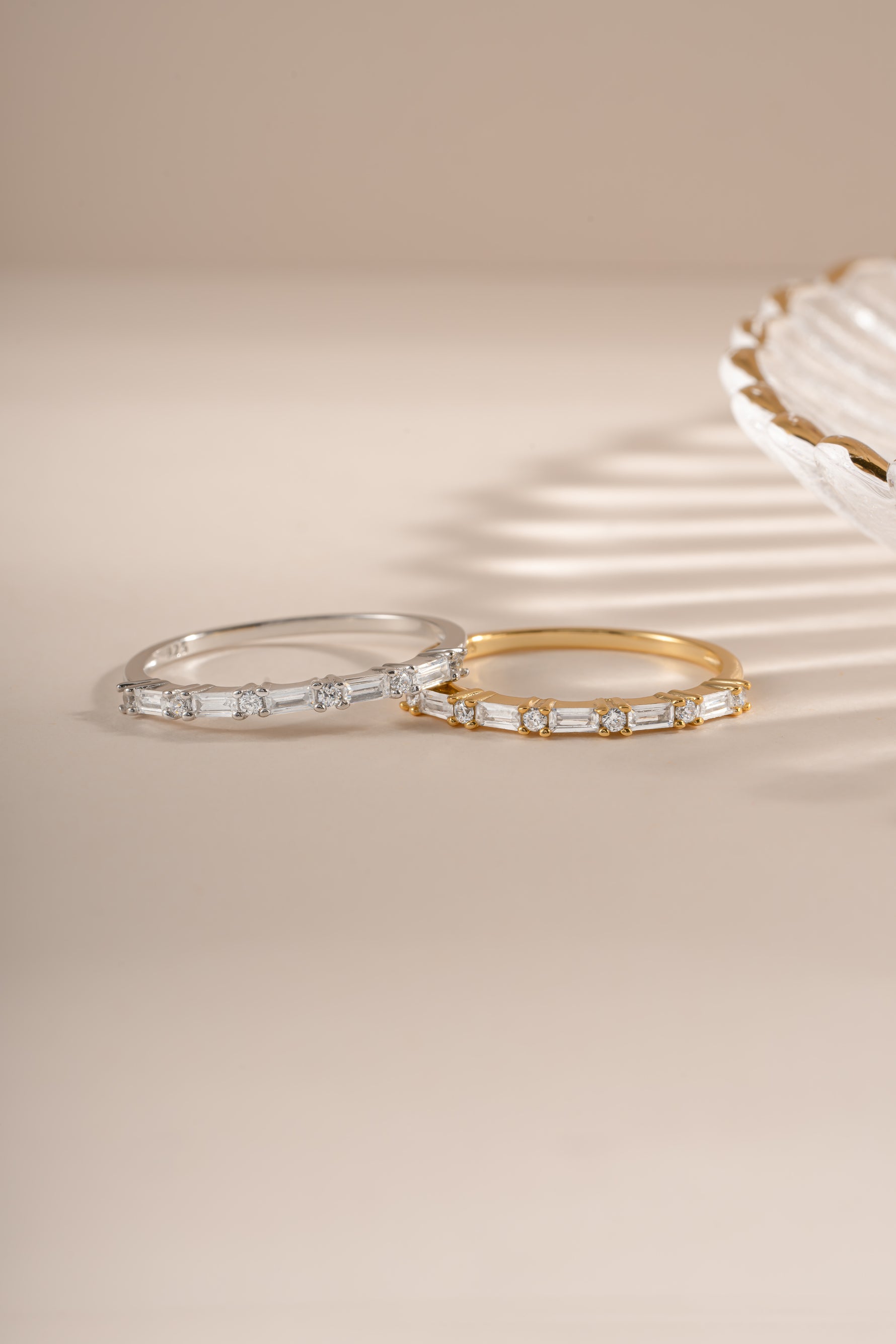 Sami Jewels baguette diamond stacking ring with gold and sterling silver band, featuring a sleek, elegant design.