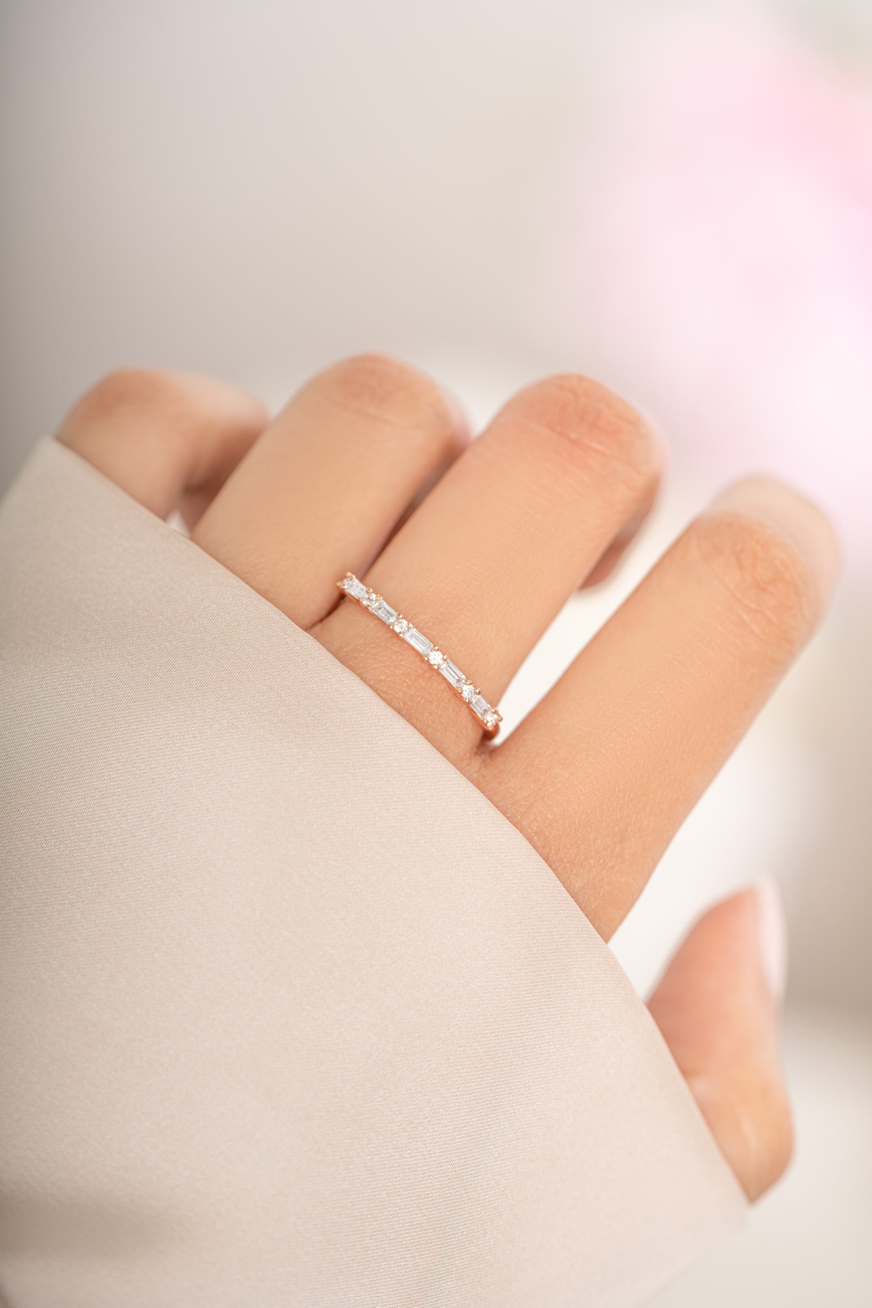 Gold Baguette Diamond Stacking Ring by Sami Jewels, showcasing elegant baguette-cut diamonds on a sleek gold band.