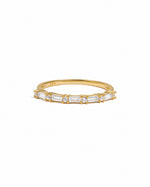 Gold Baguette Diamond Stacking Ring by Sami Jewels, featuring a sleek baguette-cut diamond design on a white background.