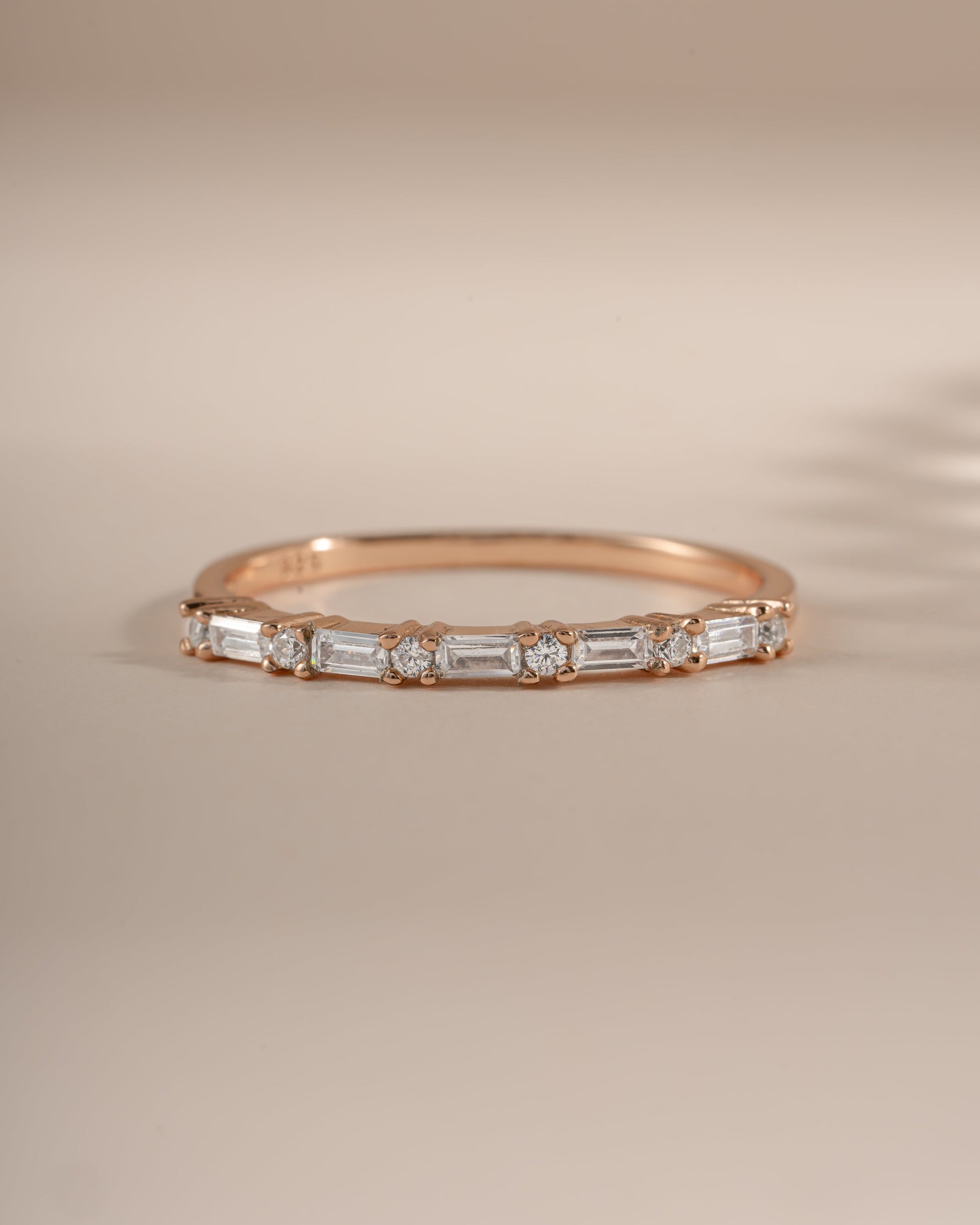 Rose gold Baguette Diamond Stacking Ring by Sami Jewels, featuring a front view of a sleek, elegant ring with baguette-cut diamonds.