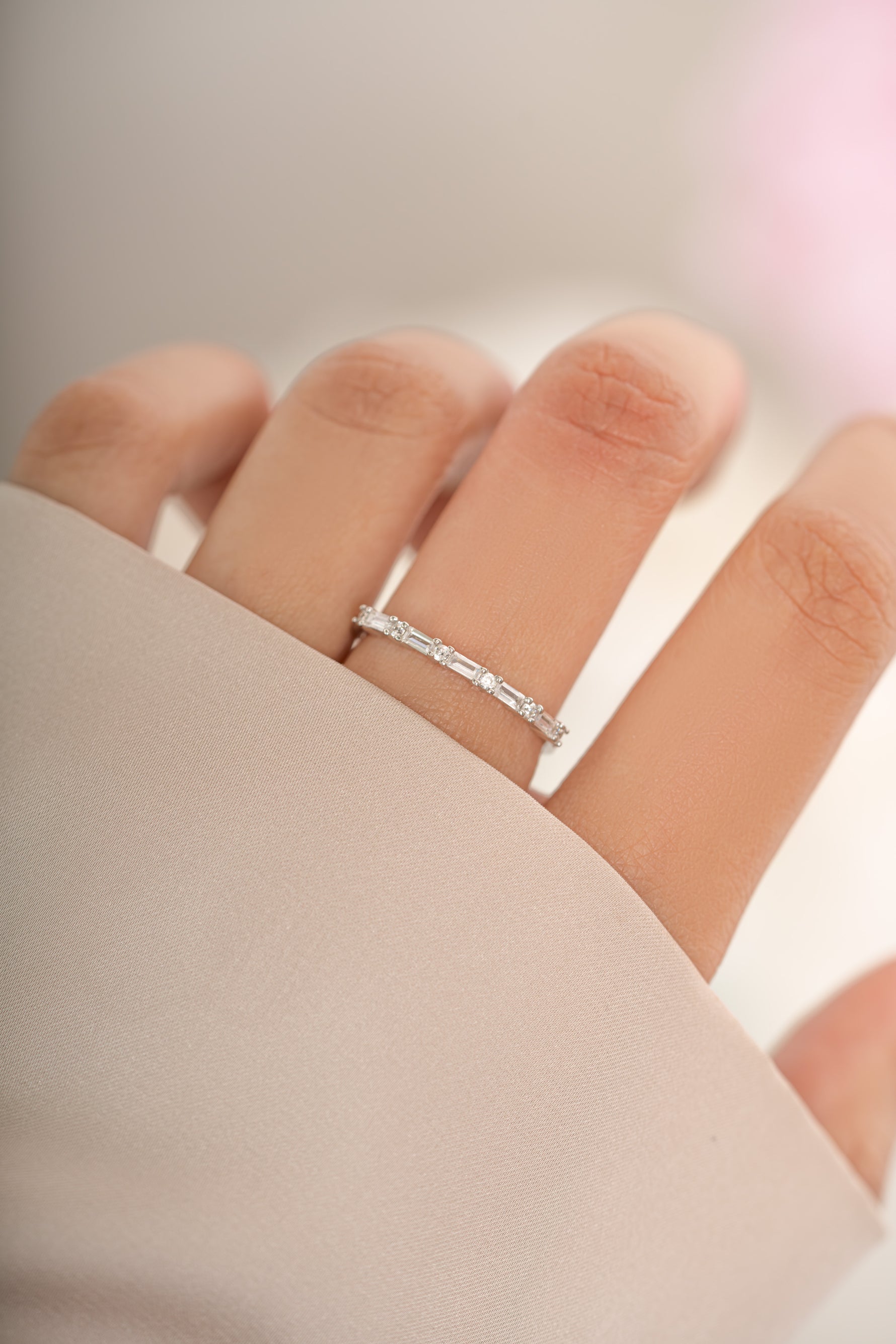Sterling silver baguette diamond stacking ring by Sami Jewels featuring a sleek, rectangular cut design.