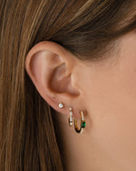 Gold Baguette Hoop Earrings by Sami Jewels displayed on a model, showcasing their elegant, elongated rectangular design.