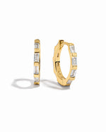 Gold baguette hoop earrings by Sami Jewels with a sleek, modern design displayed against a white background.