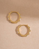 Sami Jewels Baguette Hoop Earrings shown in profile with sleek, rectangular baguette design in gold-tone metal.